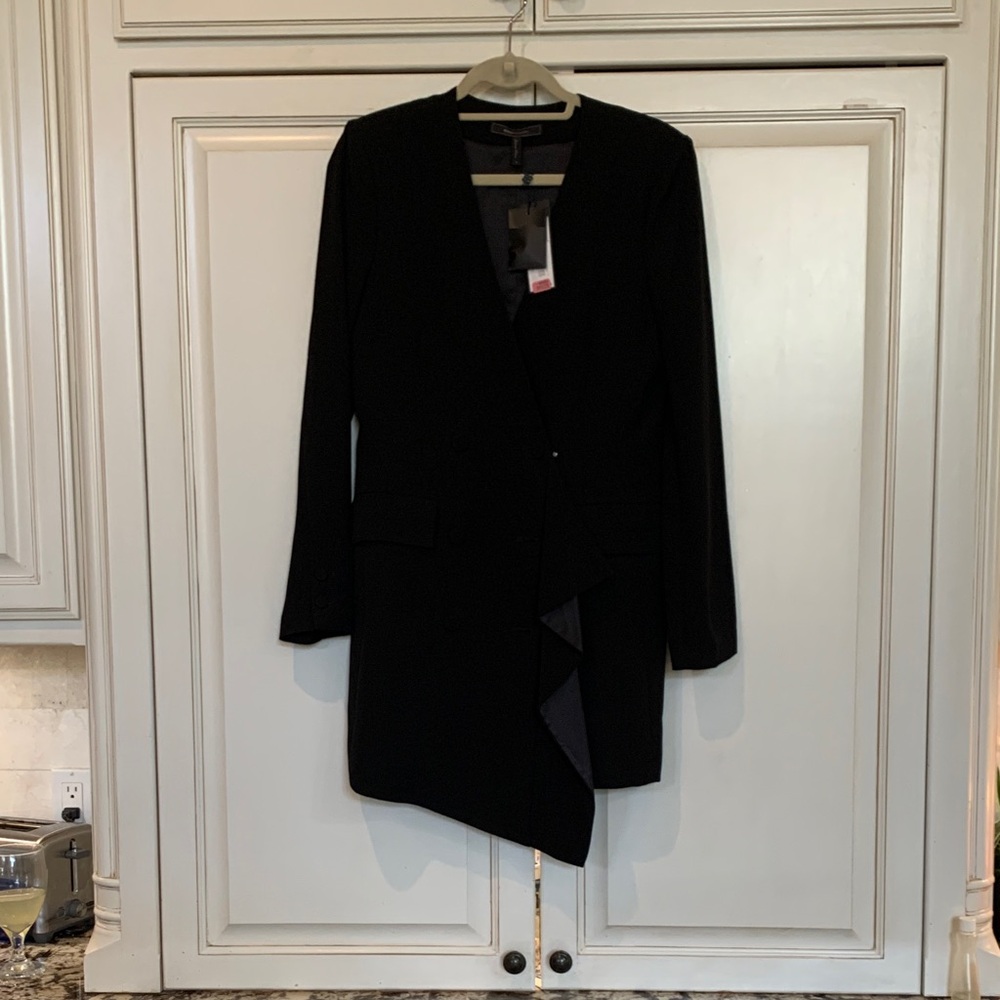 This is a BCBGMAXAZRIA Ruffled jacket Dress in black double-weave suiting. SM